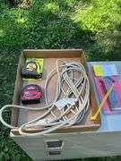 Flat of extension cords, air hose, hex keys, tape measure