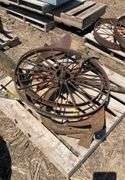 pallet of (2) metal flat spoke wheels, 3ft diameter, & (2) one bottom plows