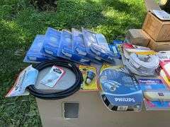 Tote of RCA connections, coaxial cable connections, surge protectors, 2-way