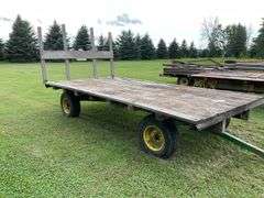16ft x 8ft Hay rack on JD 10 ton running gear