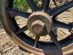 Old cast rubber tire axle & wheels : "the 4-wheel drive auto company" Watom