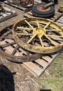 (2) JD metal rims w/cast centers off John Deere B, flat spokes