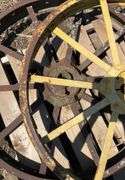 (2) JD metal rims w/cast centers off John Deere B, flat spokes