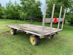 16ft x 8ft Hay rack on JD 10 ton running gear