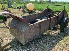 JD pull type manure spreader