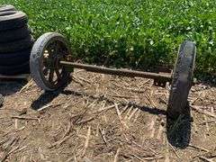Old cast rubber tire axle & wheels : "the 4-wheel drive auto company" Watom