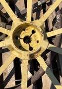 (2) JD metal rims w/cast centers off John Deere B, flat spokes