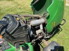 John Deere X595 Lawn Mower, 1,577 Hours, w/62” Deck, 4x4, Front Grill, Side