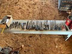 4 coffee cans of screwdrivers, pliers, and box of nails