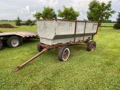 Walsh metal flare box on running gear w/ firewood