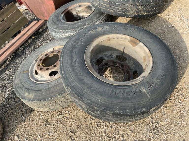 (2) 10.00-20 steer tires & rims , 16 ply tires on ball and socket rims ...