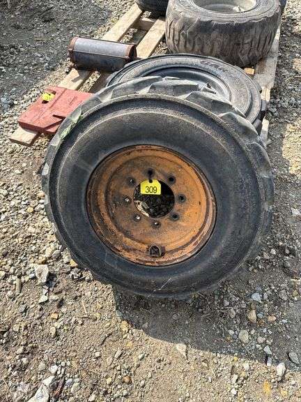 (2) 12/16.5 Skid loader Tires on Rims off Case Skid Loader