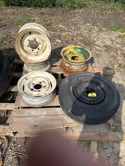 Pallet with tires and rims,

(1) 197/75r14,

(1) rim fits 11L15,

(2) 6 Bol