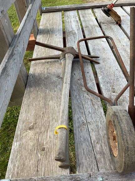 2 pickaxes and a dolly