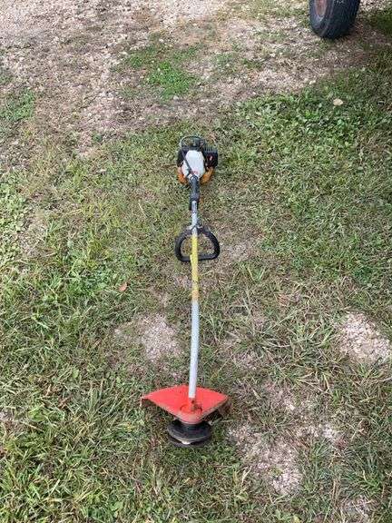 Still FS 52 Weedwhacker and a plastic hose reel