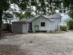 Tri-Plex Home In Owatonna, MN on Large City Lot
