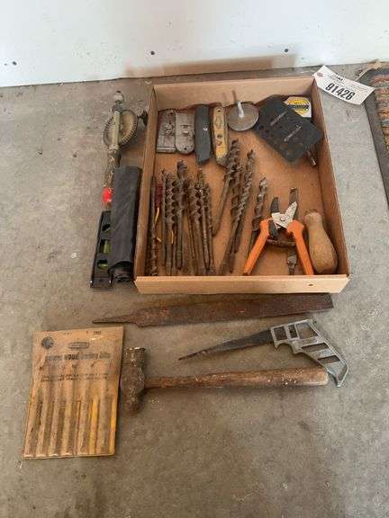 Flat containing an assortment of hand tools, drill bits/wood boring bits, f