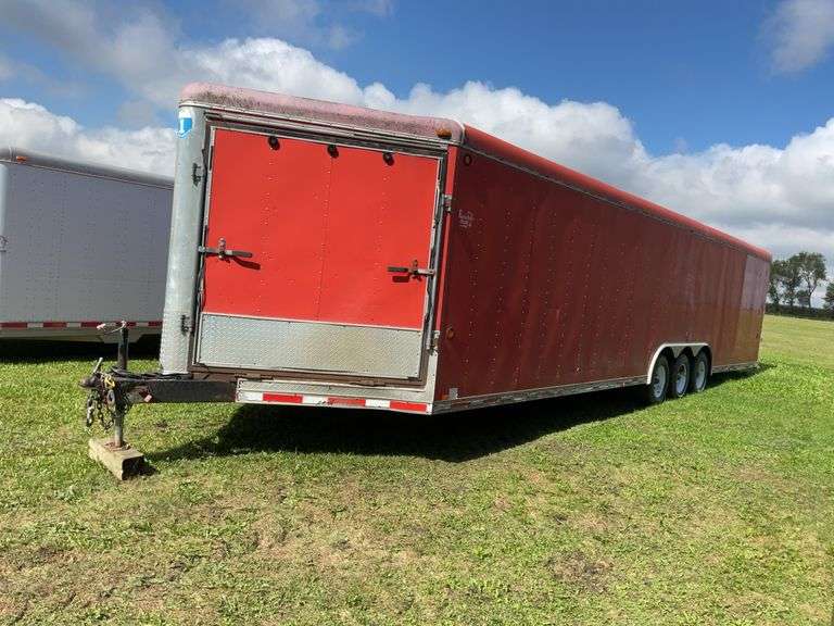 ** 2003 Haulmark enclosed trailer; 34ft + 4ft drive out V-nose; tri-axle