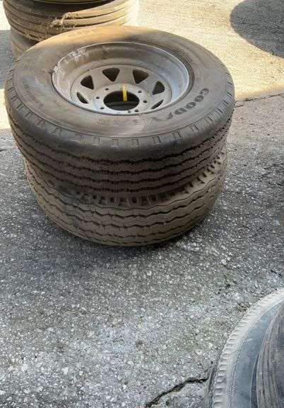 (2) 9.5R16.5 tires on 8 bolt rims