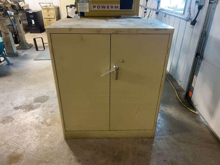 Metal shop storage cabinet 21“ x 36“ x 42“ selling with contents