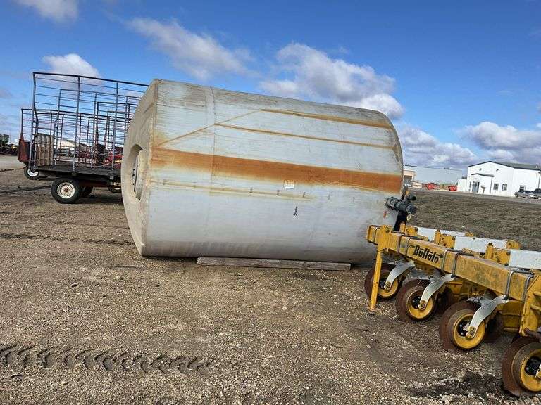 5000 gal poly tank 

8 1/2ft diameter, 12 1/2ft standing up