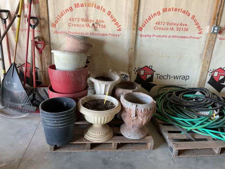 Pallet of plant pots and potting soil