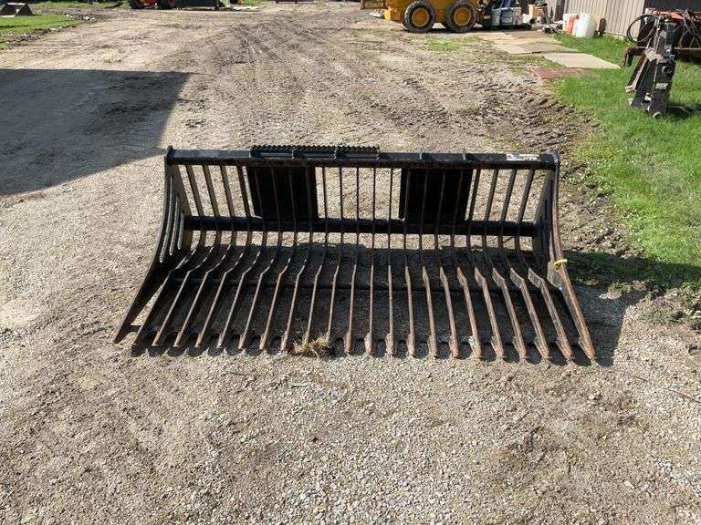 John Deere R75 75” skid loader mount rock bucket