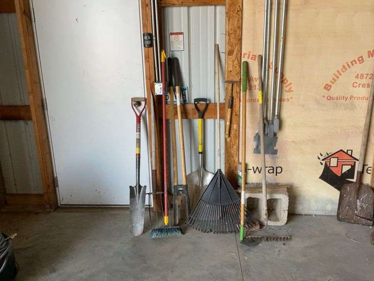 Rakes, shovels, post hole digger