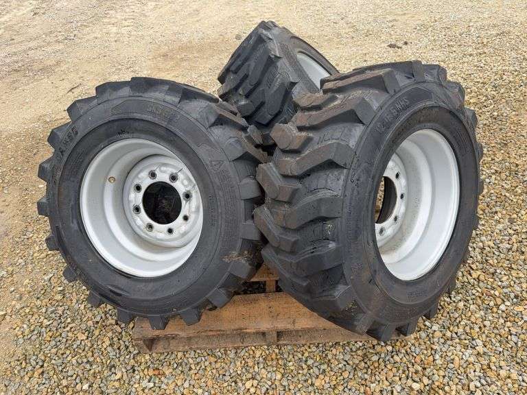 Set Of (4) 12-16.5 Skidloader Tires On 8 Bolt Rims