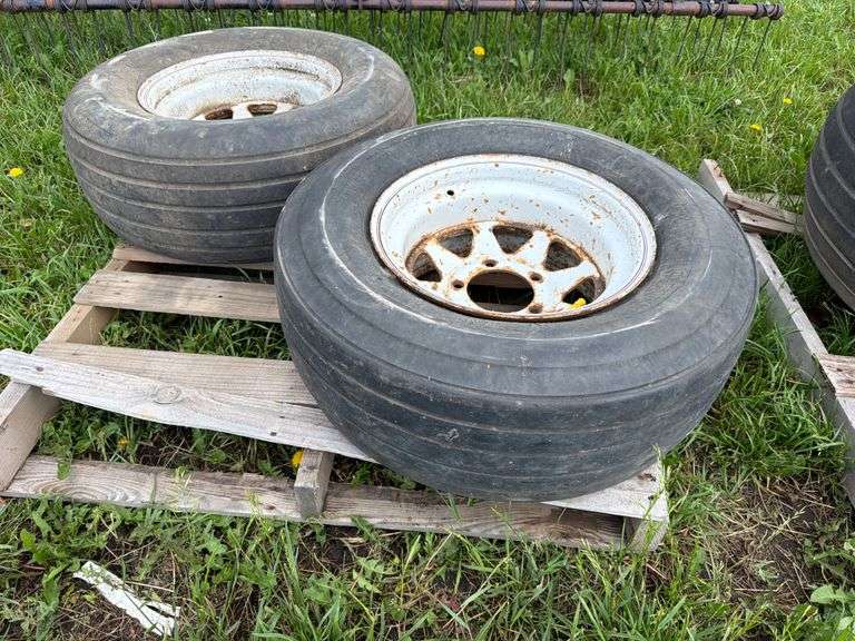 (2) Implement tires 11L-15 on 5 bolt rims
