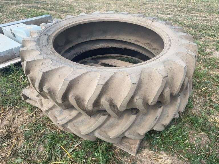 (2) Mismatching 11.2-36 Tires