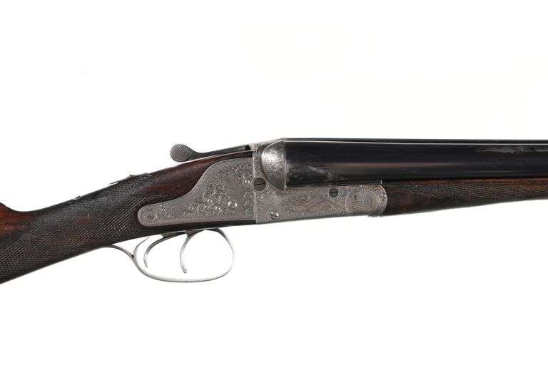 C. Lancaster SxS Shotgun 12GA