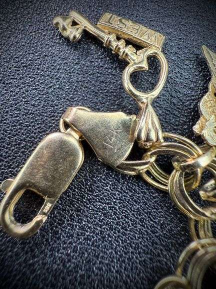 14K Yellow Gold Charm Bracelet w/ 29 Gold Charms