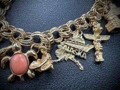 14K Yellow Gold Charm Bracelet w/ 18 Gold Charms