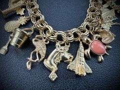 14K Yellow Gold Charm Bracelet w/ 18 Gold Charms