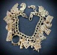 14K Yellow Gold Charm Bracelet w/ 29 Gold Charms