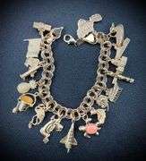 14K Yellow Gold Charm Bracelet w/ 18 Gold Charms