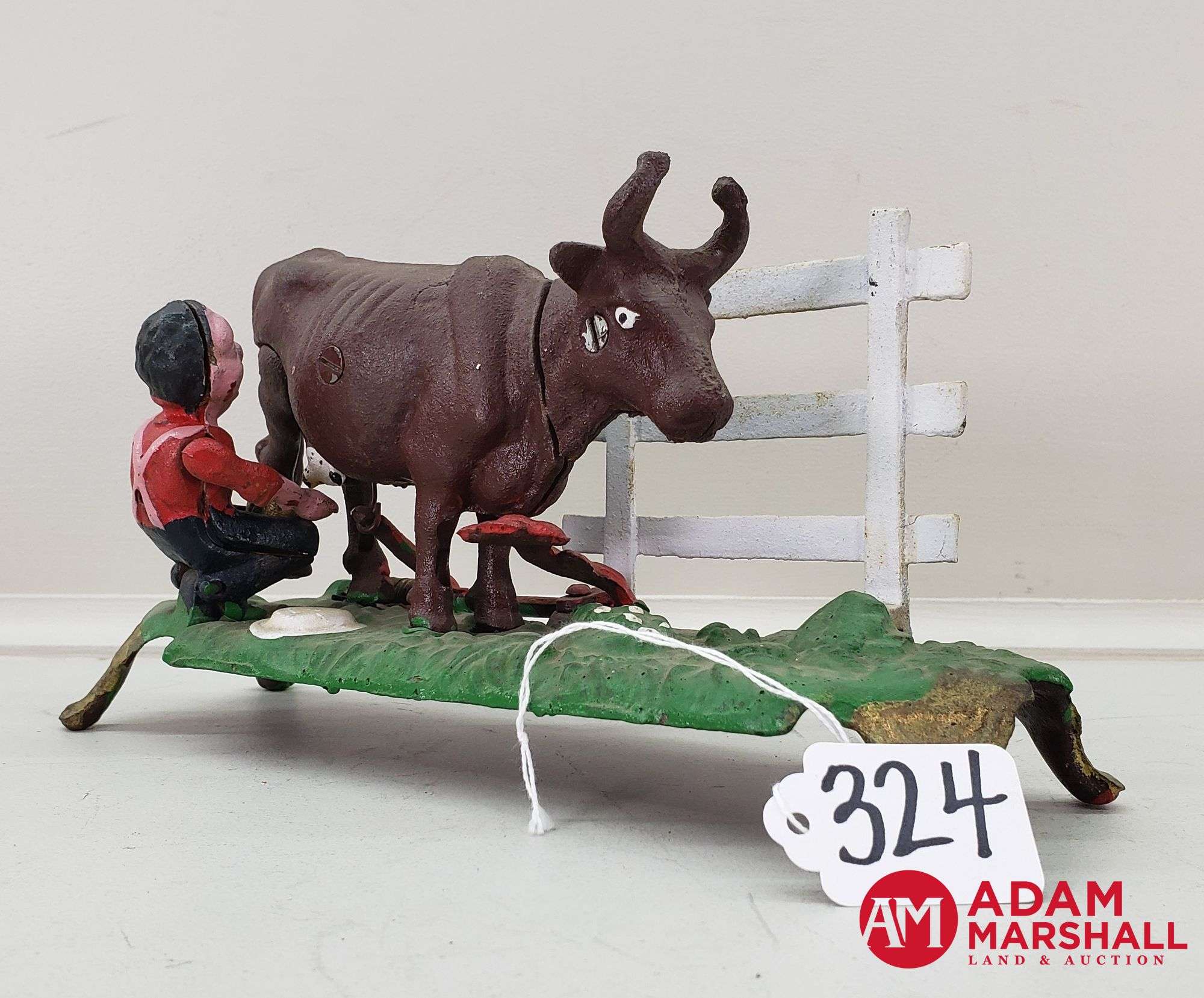 Vintage Cast Iron Mechanical Bank Kicking Milking Cow. Made in