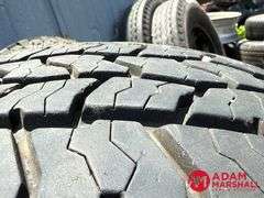 (1) USED Ironman, All Country Tire - LT265/65R17