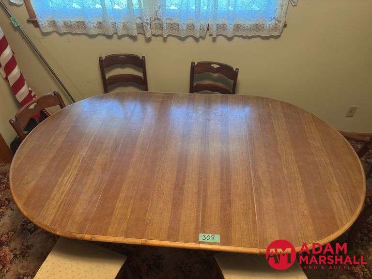 Wooden Table with 3 Leaves & 6 Chairs