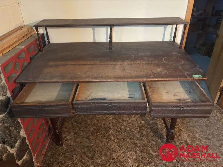 Large Vintage Bank Teller Desk. Measures 60 by 34 by 55 tall