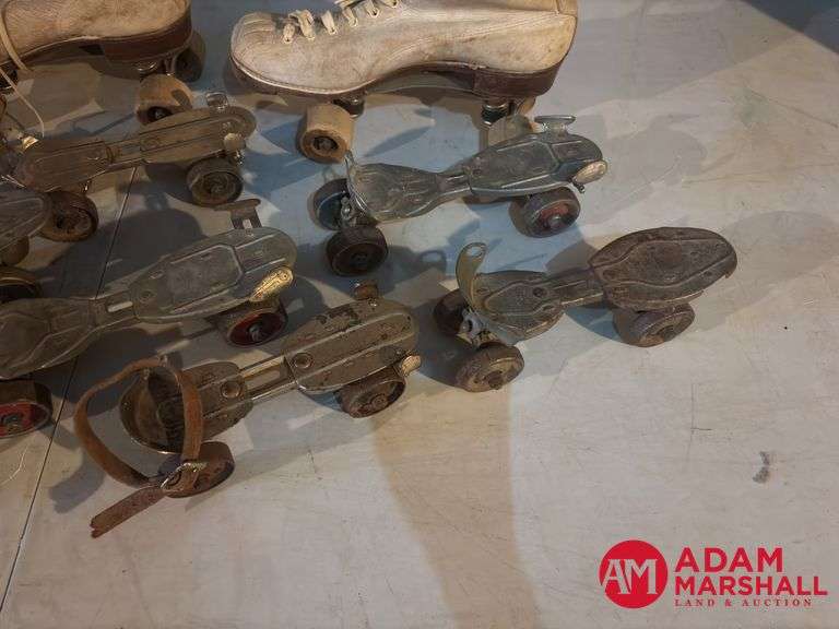 One Set of Shoe Roller Skates and  8 Strap On Skates