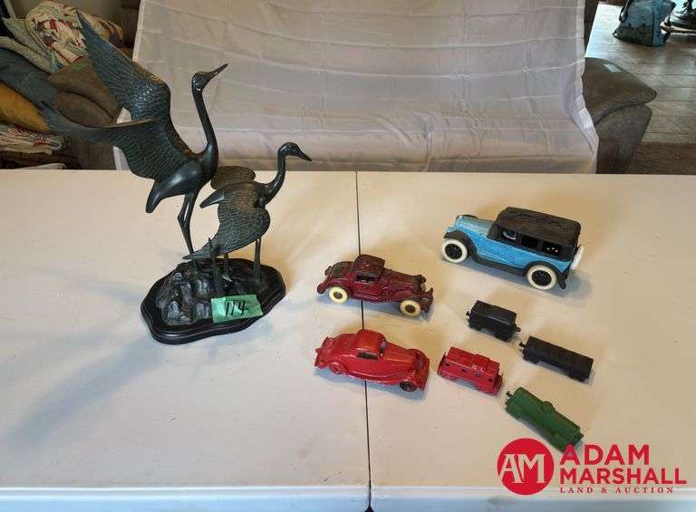 Some Cast Iron Toys & Crane Sculpture