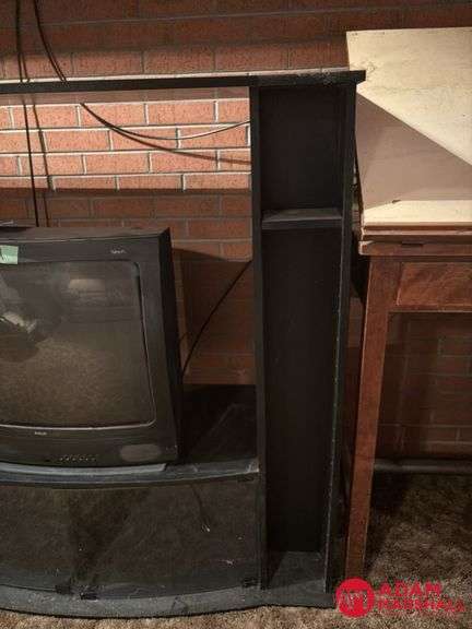 Entertainment Center and TV Measures 54 by 20 by 49.  TV 25 In