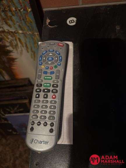 Entertainment Center and TV Measures 54 by 20 by 49.  TV 25 In