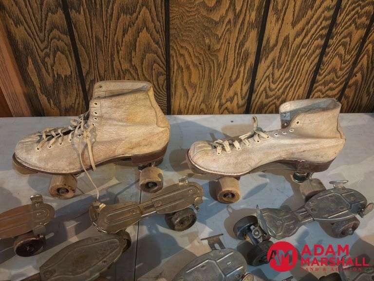 One Set of Shoe Roller Skates and  8 Strap On Skates