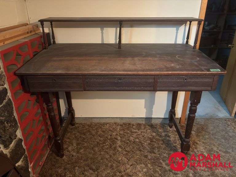 Large Vintage Bank Teller Desk. Measures 60 by 34 by 55 tall