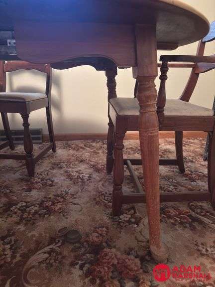 Wooden Table with 3 Leaves & 6 Chairs