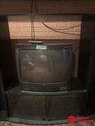 Entertainment Center and TV Measures 54 by 20 by 49.  TV 25 In