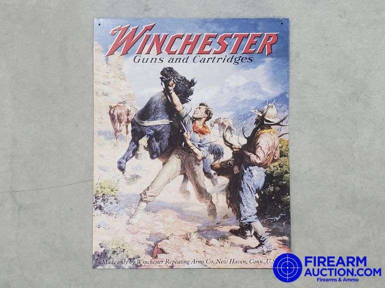 Winchester Repeating Arms Co "Guns & Catridges" Tin Sign - 12.5" x 16"